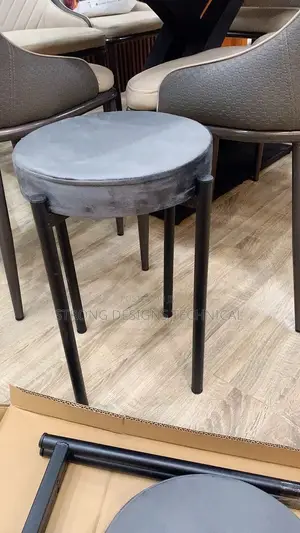 Round Cushioned Stool.