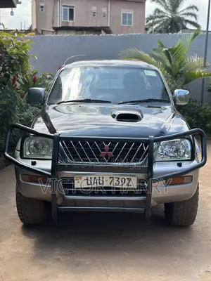 Photo - Mitsubishi L200 Double Cab 2.5 TD 4WD 2003 Black