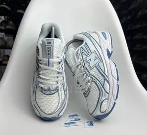 Classic White/Blue New Balance 740 Running Sneakers