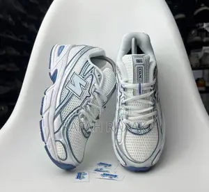 Classic White/Blue New Balance 740 Running Sneakers
