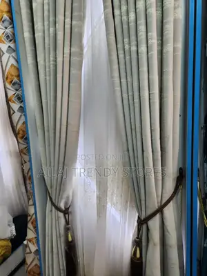 Cream Engaging Curtains Per Finished Metre