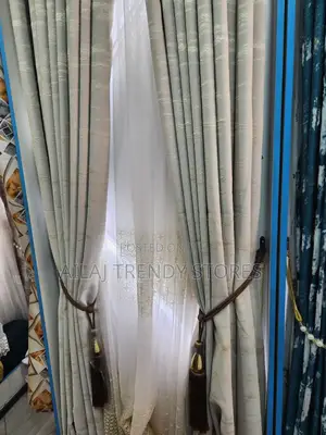 Cream Engaging Curtains Per Finished Metre