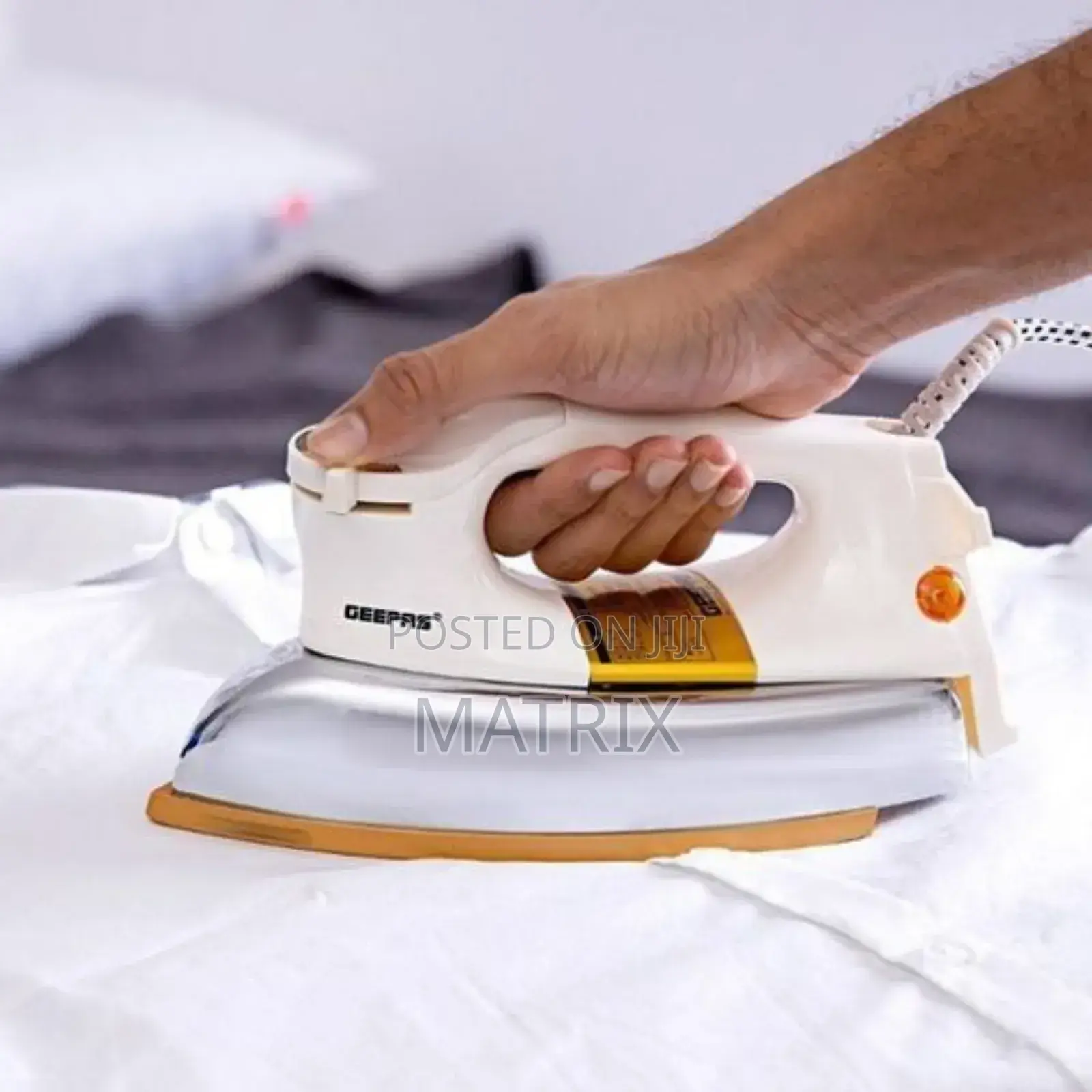 Geepas Heavy Weight Dry Iron Non Stick Sole Plate