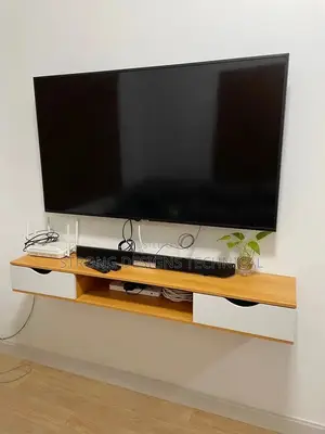 Photo - Wall Mounted Tv Stand / Tv Cabinet