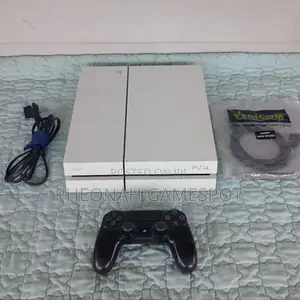 Playstation 4 Standard Chipped 15 Games and 2 Controllers