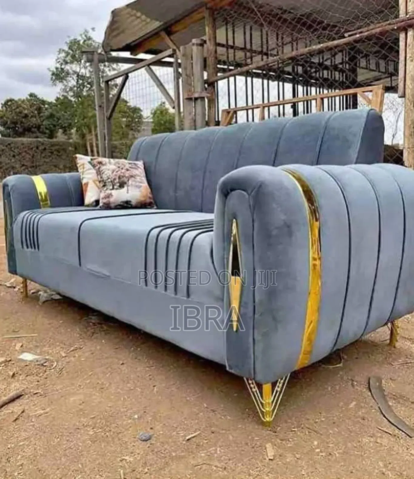 A Three Seater With a Golden Stands