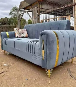 A Three Seater With a Golden Stands