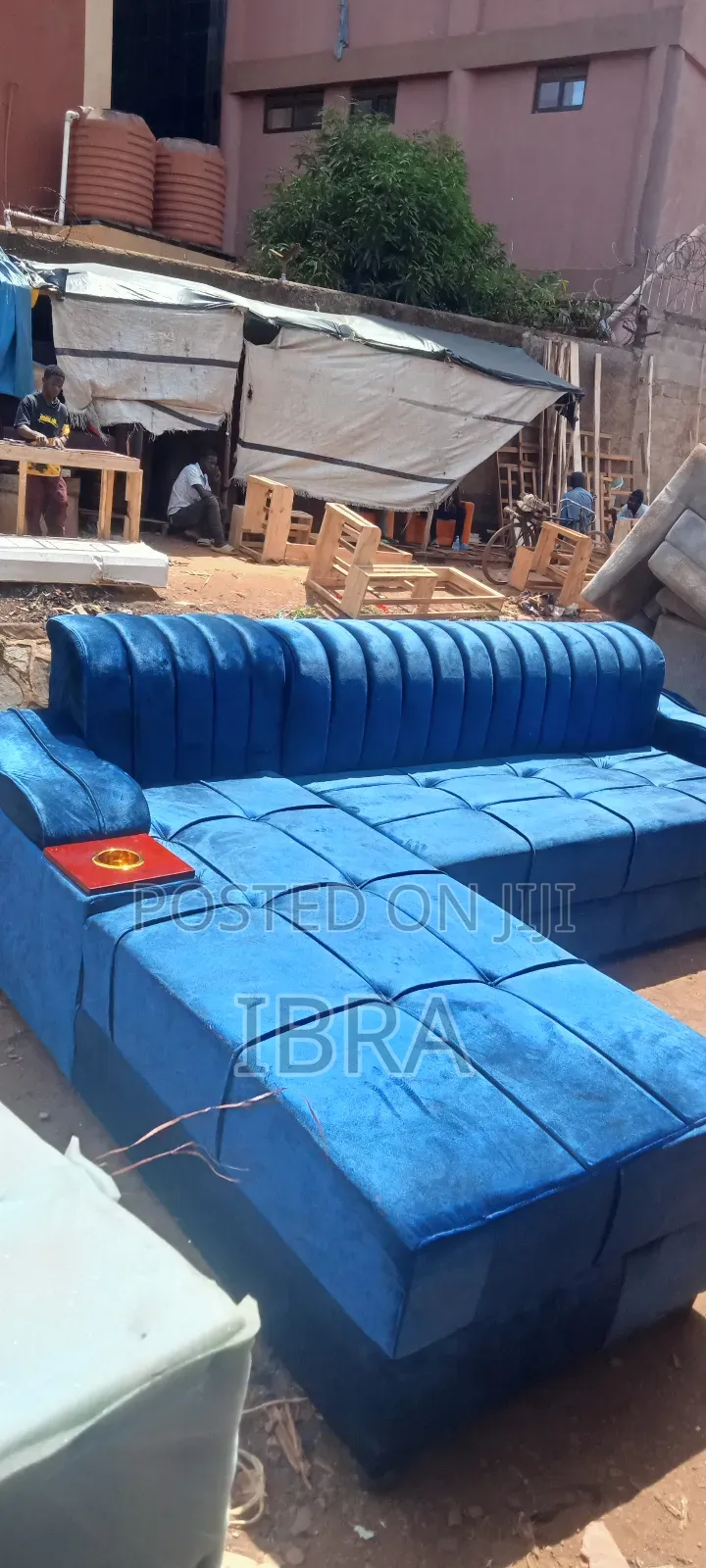 A Shinny Blue Corner Sofa Set With a Good Material