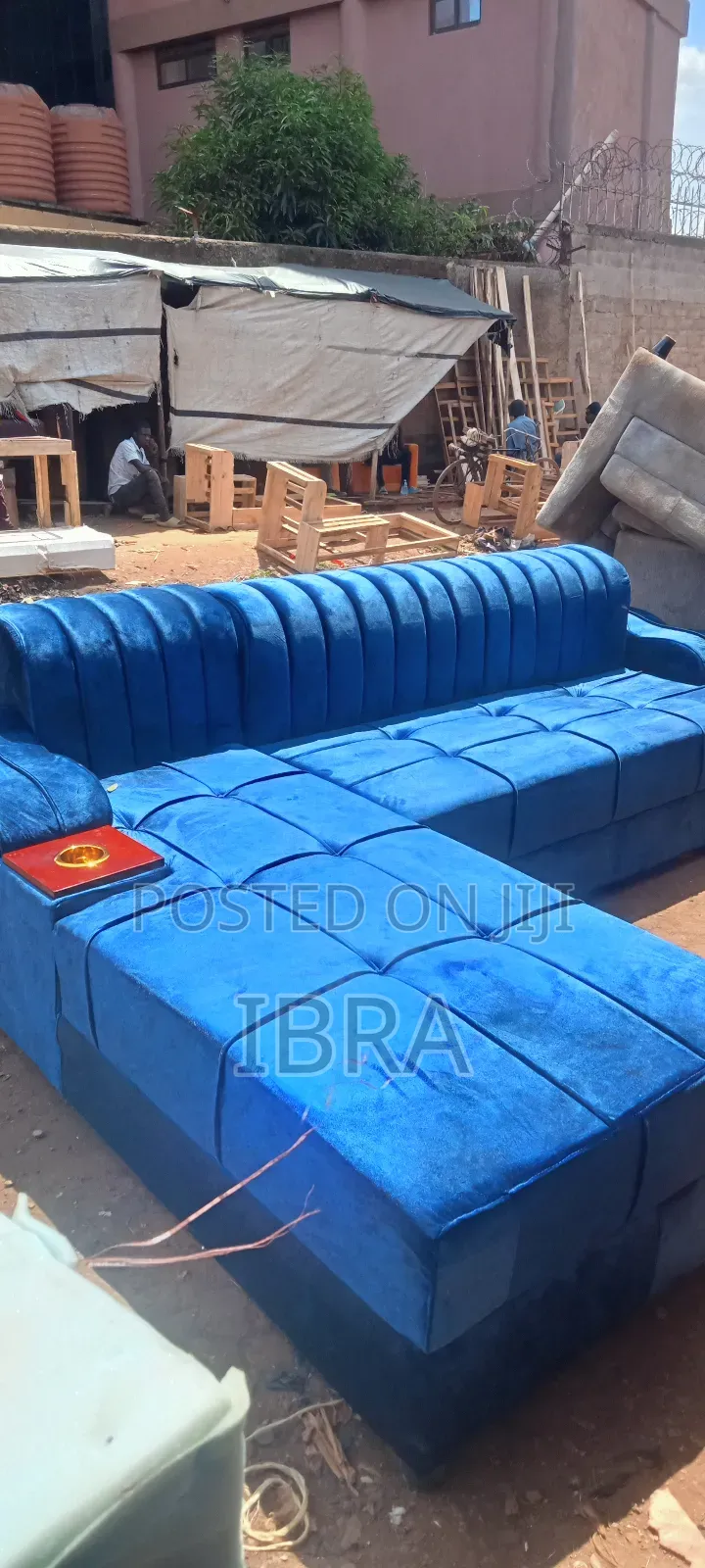 A Shinny Blue Corner Sofa Set With a Good Material