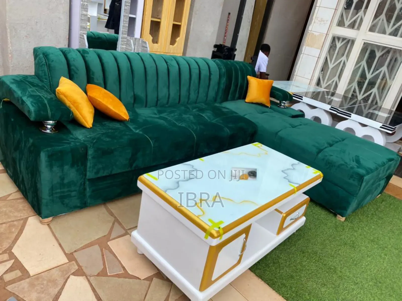 A Green L Shaped Corner Sofa Set