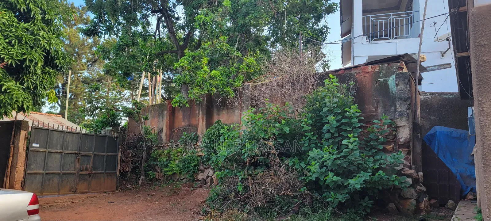 100ft by 100ft at 900m Mutungo Biina Zone 5