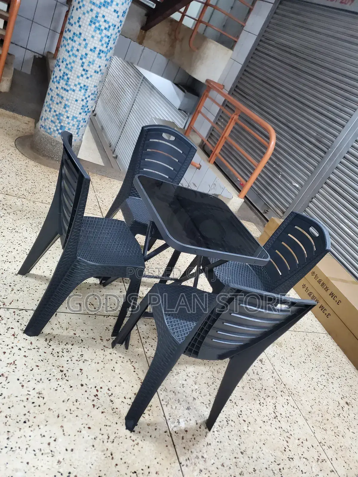 Plastic Chairs and Square Glass Table Set for Unique Dining
