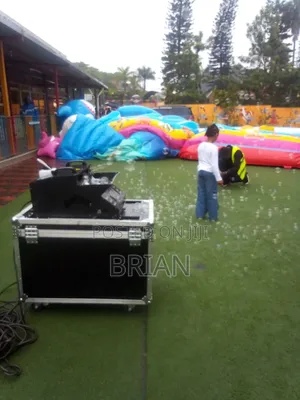 Bubble And Fog Machine With Bubble Liquid On Hire