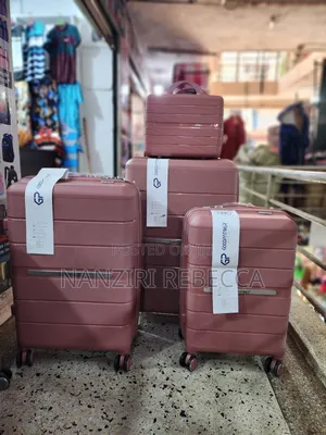 Photo - 4pc Rubber Suitcases Light Peach