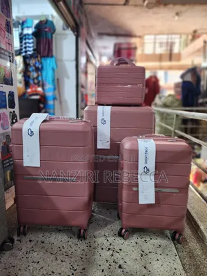 Photo - 4pc Rubber Suitcases Light Peach