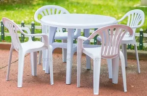 Photo - White Plastic Table and Chairs for Unique Restaurant/Bar