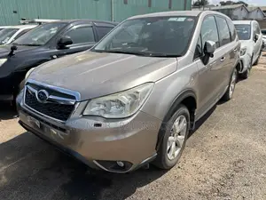 Subaru Forester 2.0XT Touring 4dr SUV AWD (2.0L 4cyl Turbo CVT) 2014 Gold