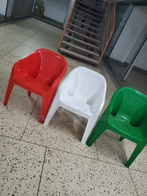 Photo - White/Red and Green Plastic Sofa Chairs