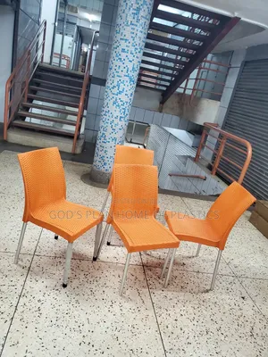 Photo - Orange Armless Plastic Chairs Plastic Chairs