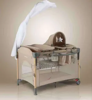 Photo - Baby Bassinet Bedside Sleeper Crib With Storage Basket