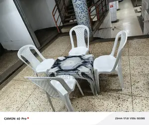 Plastic Chairs and Medium Table