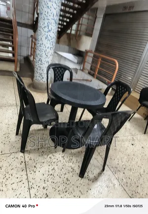 Photo - A Set of Plastic Tabe and Chairs