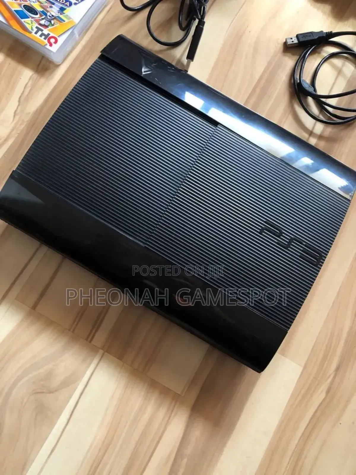 Playstation 3 Super Slim With 20 Games and 2 Controllers
