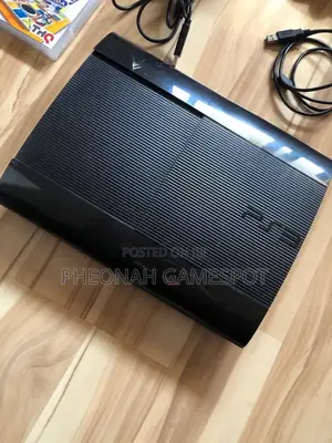 Playstation 3 Super Slim With 20 Games and 2 Controllers