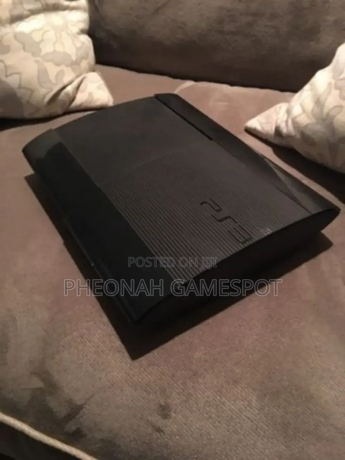 Playstation 3 Super Slim With 20 Games and 2 Controllers