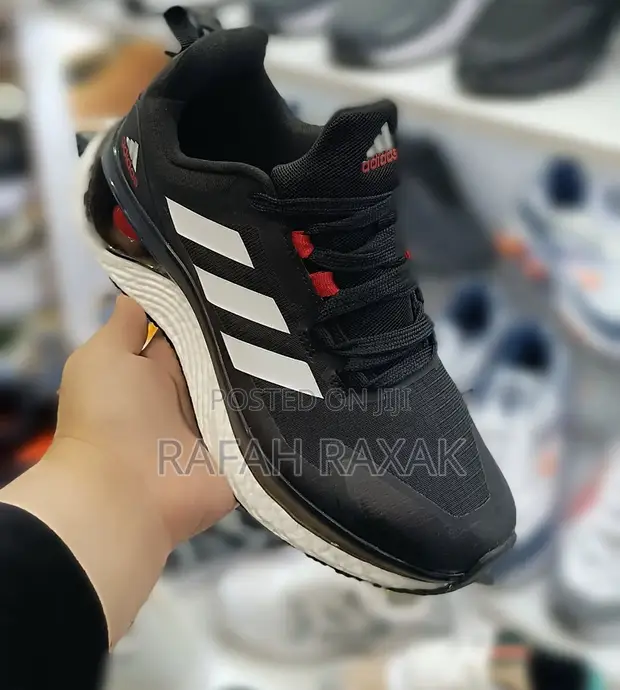 Original Black/White Adidas Ultra Boost 22 Gym Running Shoes for sale -  Rafah Raxak  Price: USh 210,000 on Jiji.ug [Central Division]