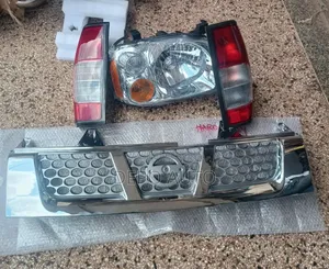 A Set of Headlamps, Taillamps and Grille Hardbody