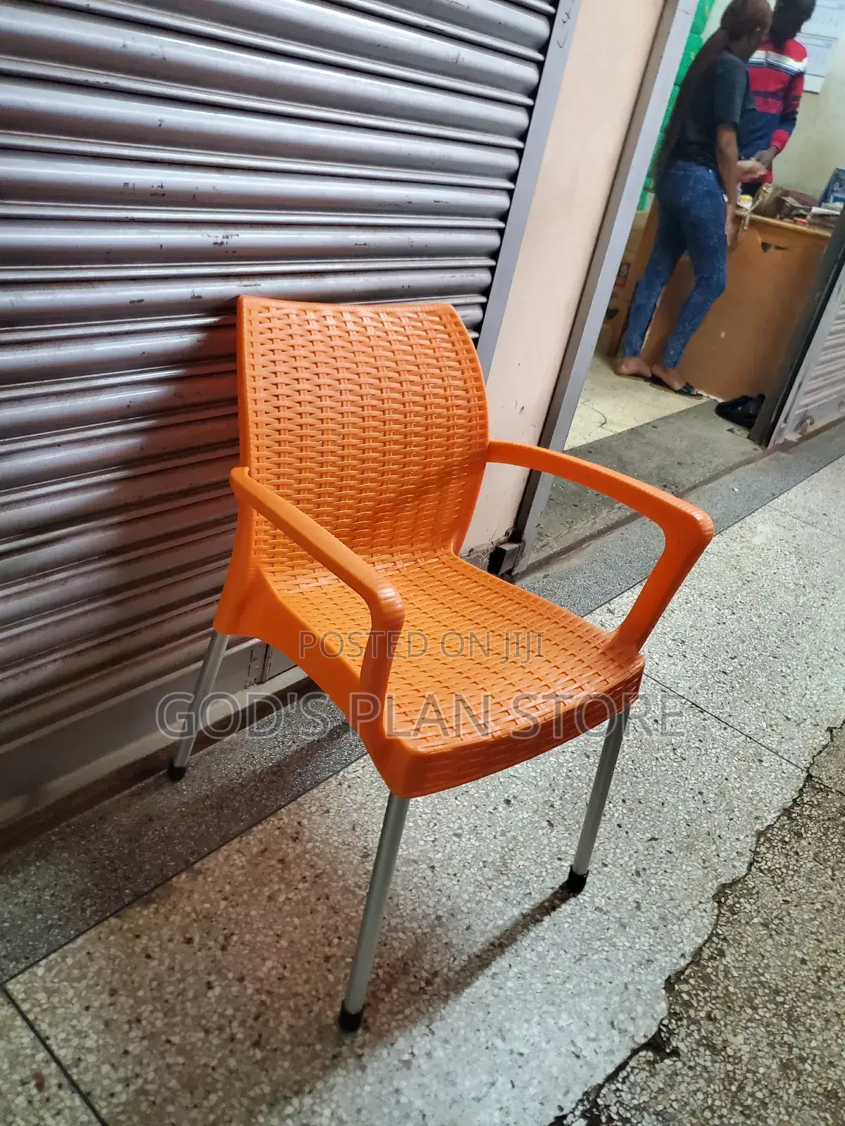 Textured Armed Orange Plastic Chairs Plastic Chairs