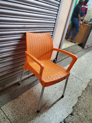 Textured Armed Orange Plastic Chairs Plastic Chairs