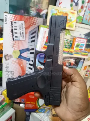 Realistic Battery-Operated Toy Pistol With Sound Light