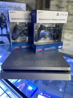 Photo - Playstation 4 Slim, 1tb Storage, 19 Games and 2 Controllers