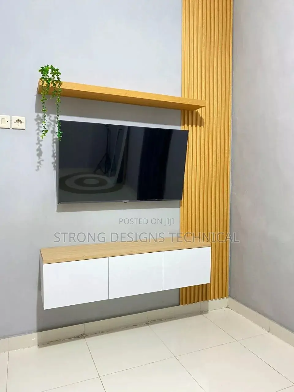 Simple Wall Unit Set Up With Floating Shelf.