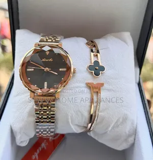 Aoerbo Ladies Silver Wrist Time Piece With a Bracelet
