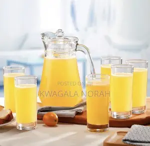A Set of 6 Unique Ceramic Glasses With a Jar