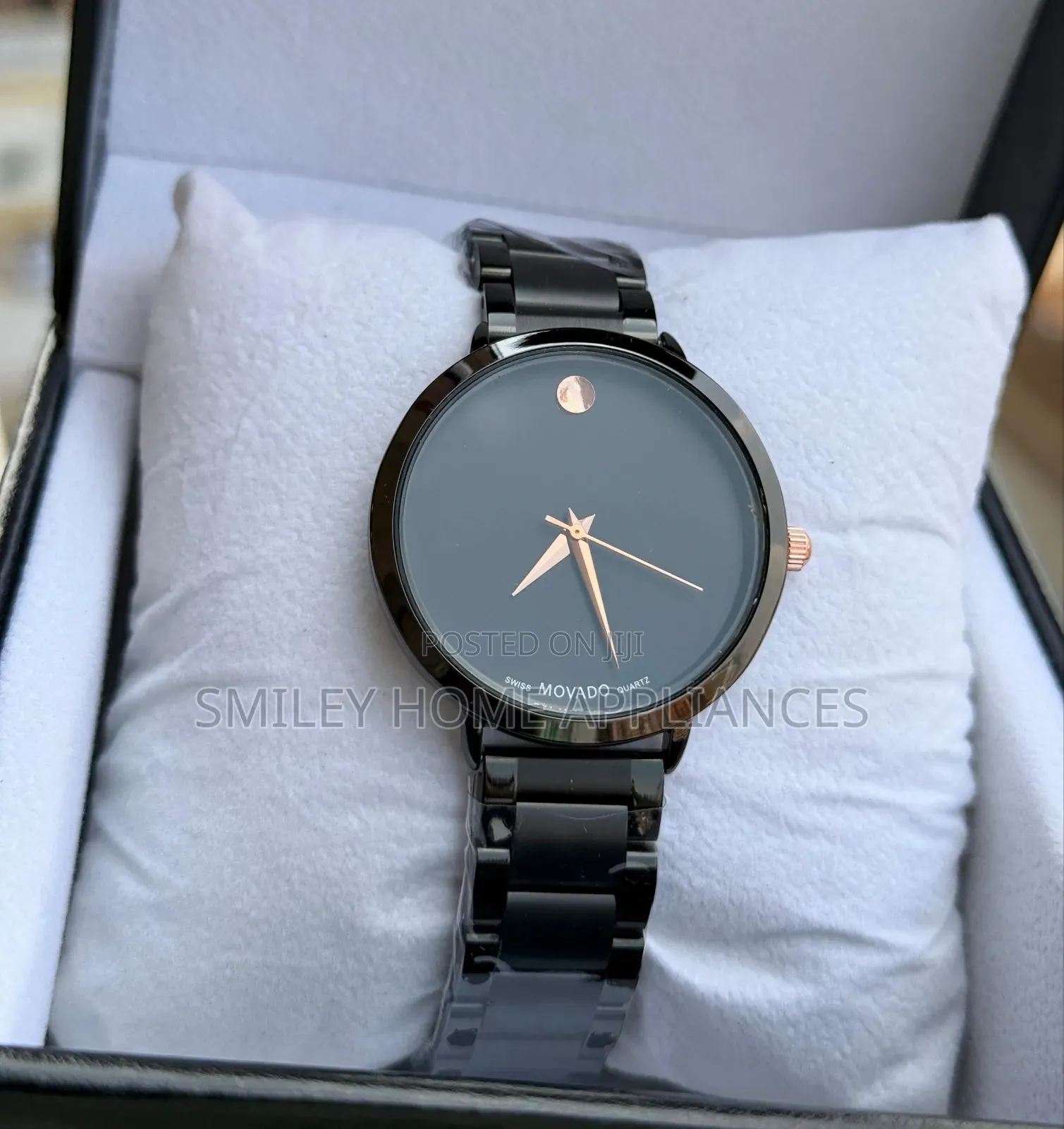 Black Face and Strapped Movado Women's Classy Time Piece
