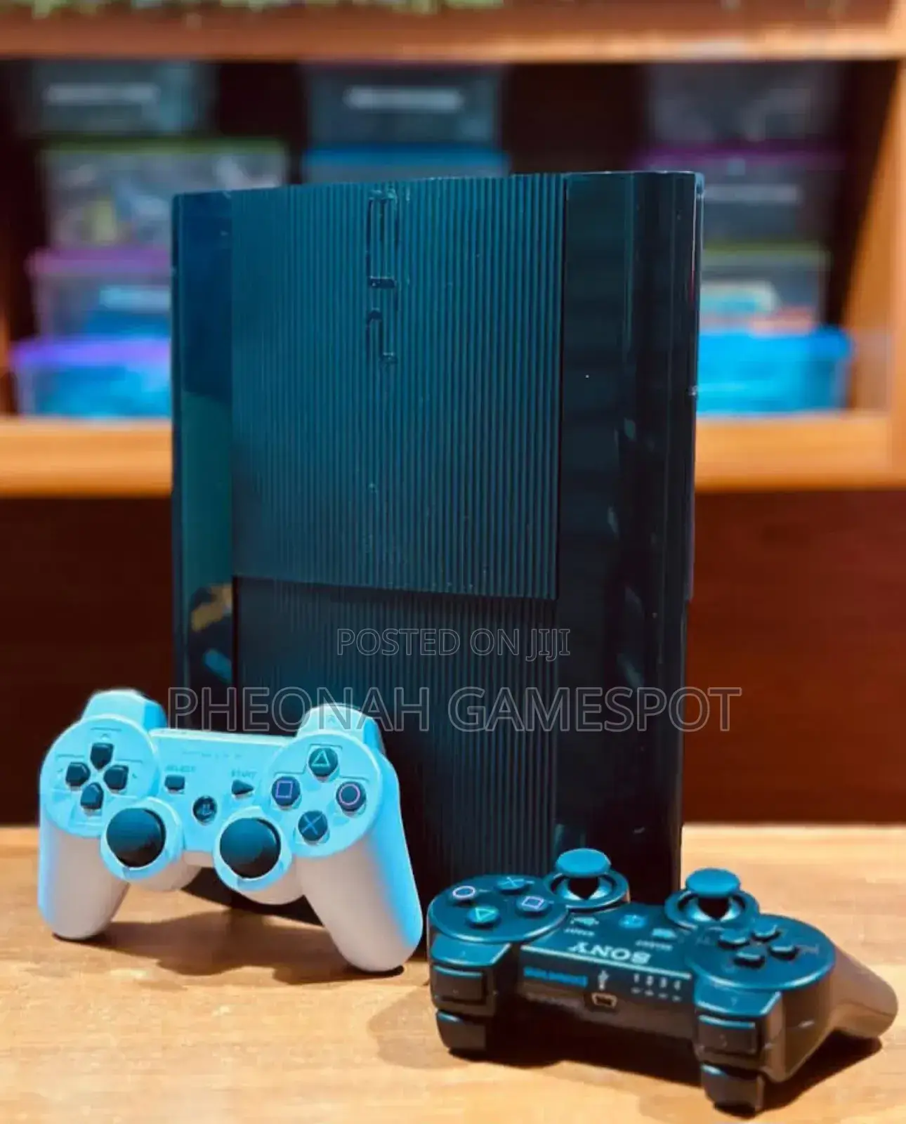 Playstation 3 Super Slim With 20 Games and 2 Controllers.