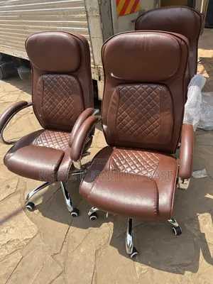 Photo - Brown Leather Office Chairs