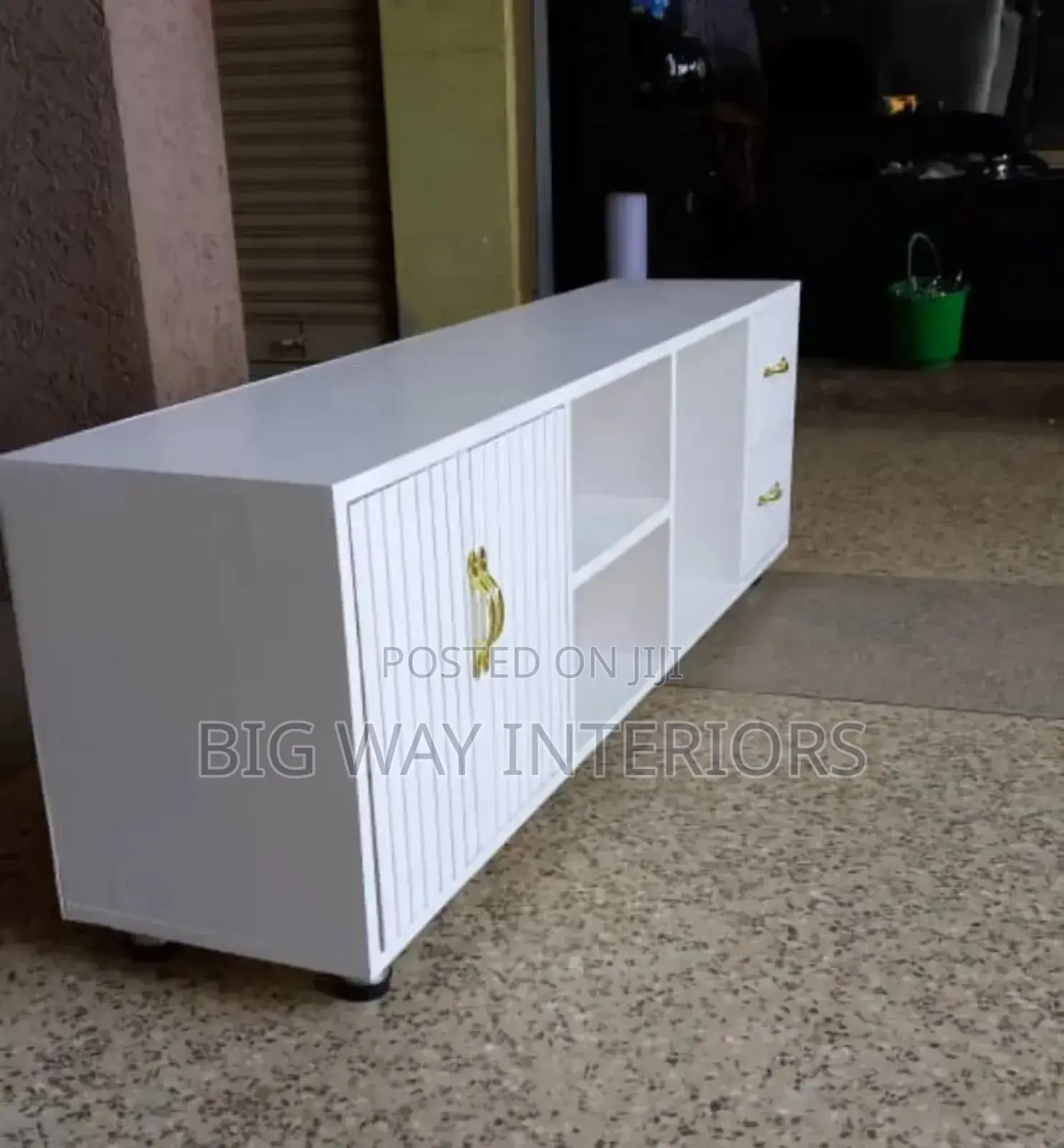 White and Gold Handled Tv Stand With 3 Open Spaces