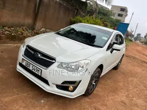 Photo - Subaru Impreza 2.0i Limited 4-dr 2013 White