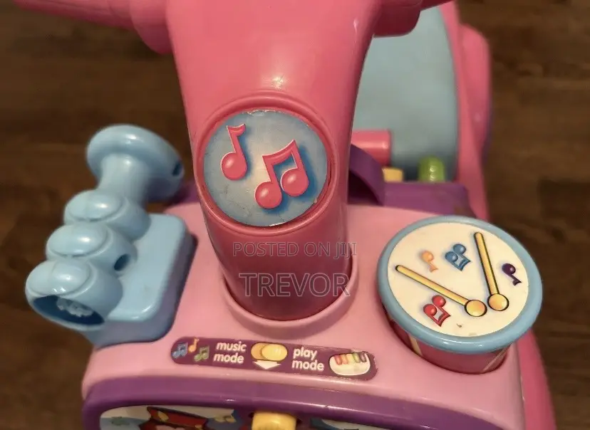Fisher-Price Little People Music Parade Ride-on Toy