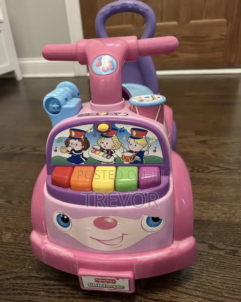 Fisher-Price Little People Music Parade Ride-on Toy