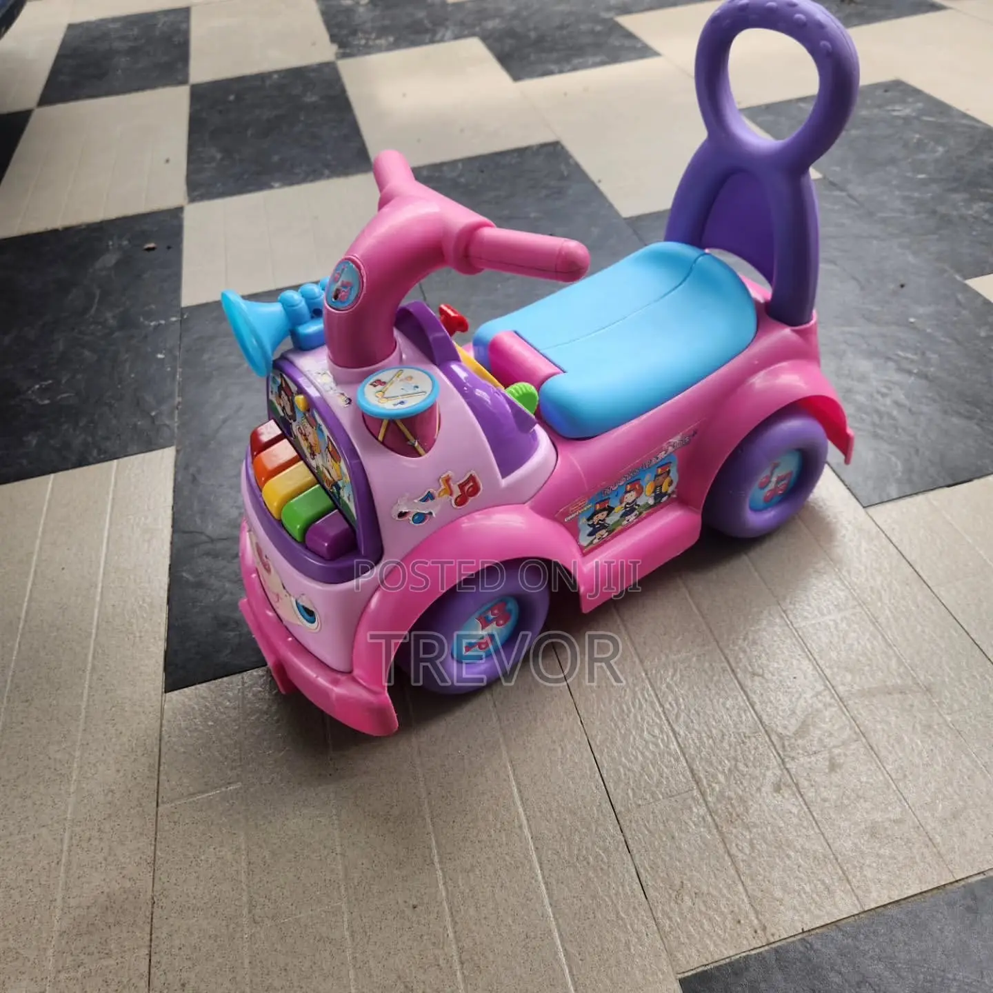 Fisher-Price Little People Music Parade Ride-on Toy