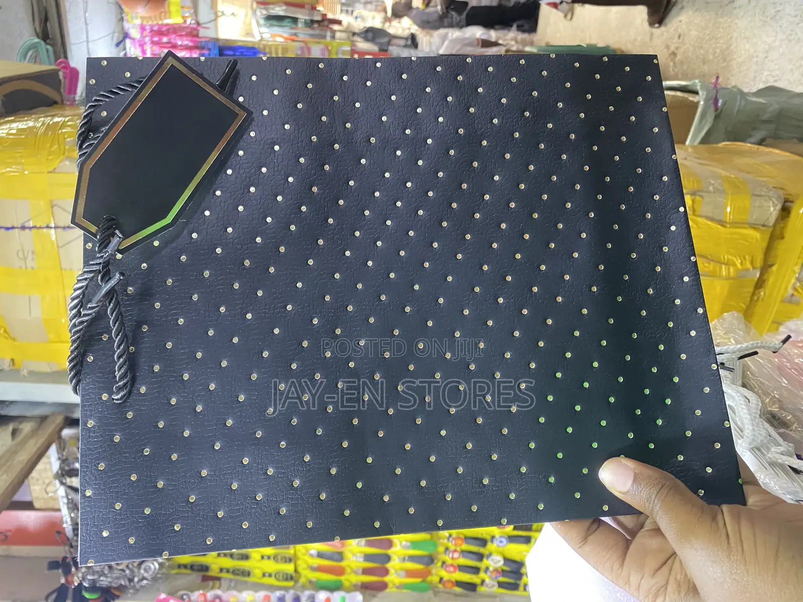 A Dozen of Black Gold Coated Gift Packaging Bags