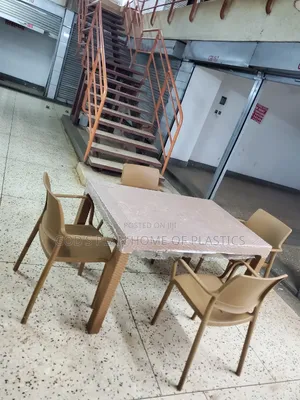 Photo - Cocktail Dining Table and Plastic Chairs