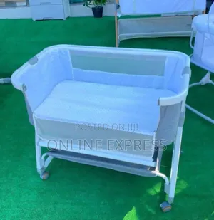 Photo - Baby Bassinet Bedside Crib