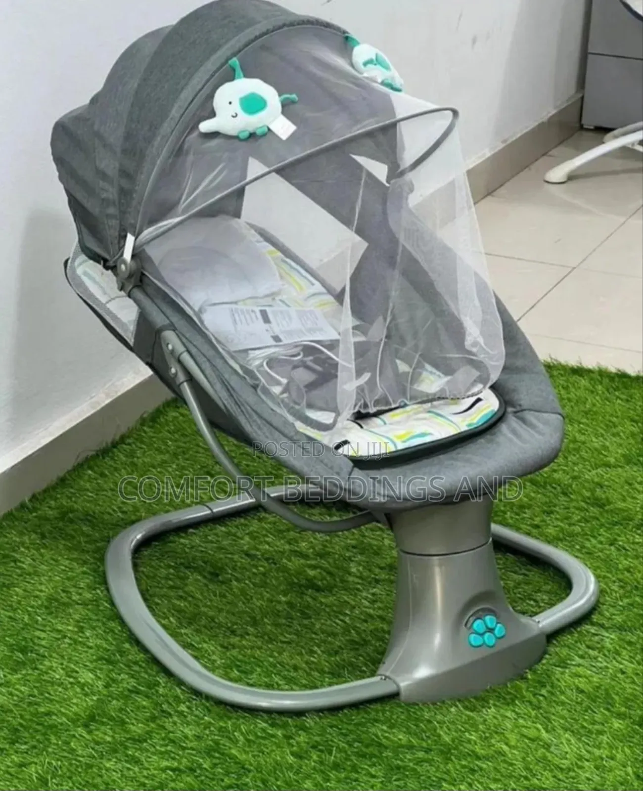 Electric Baby Swing With a Mosquito Net